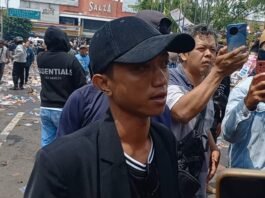 Koordinator aksi demo Pati Husen