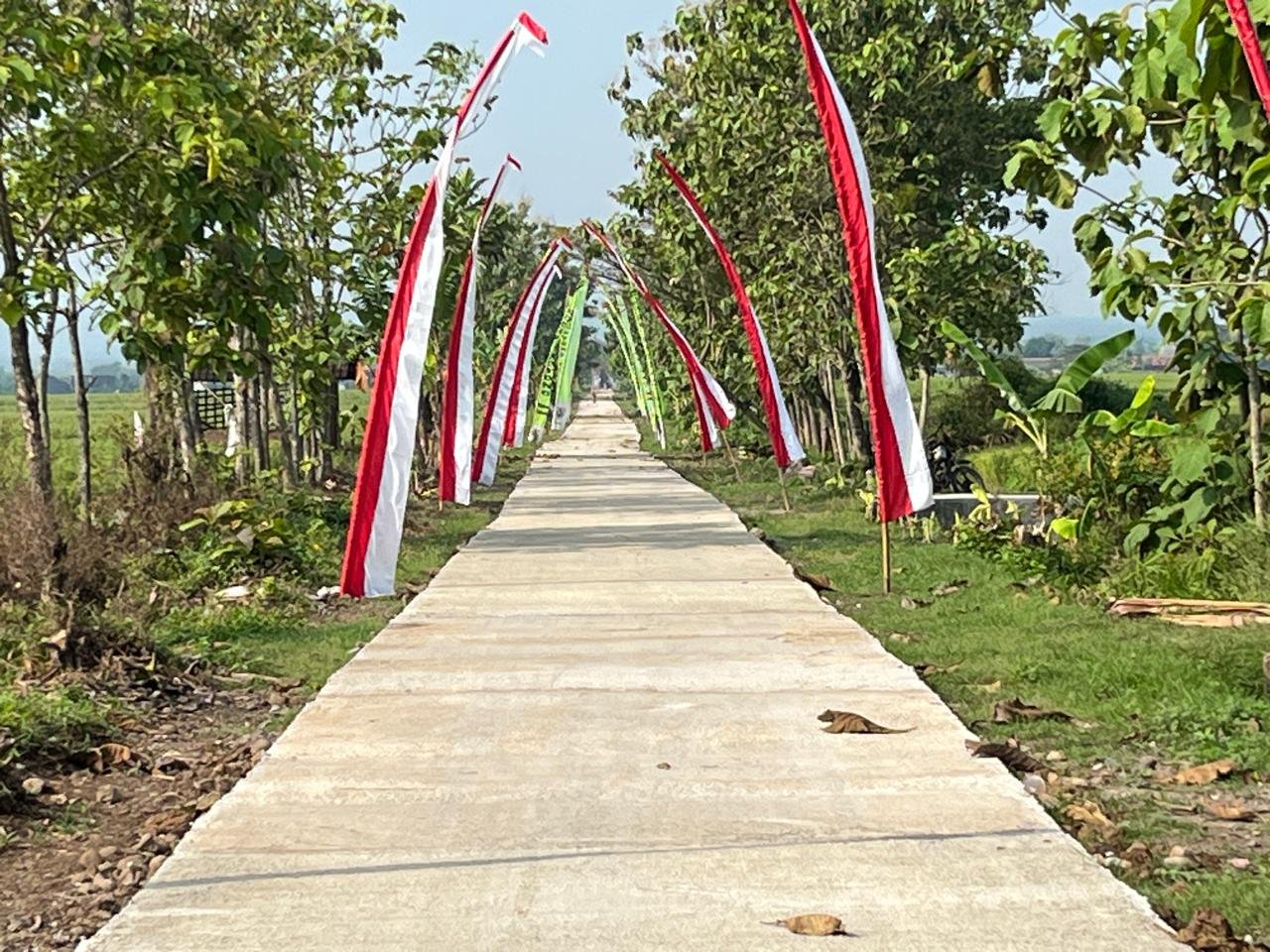 TMMD Sragen Jalan betonisasi hasil Program TMMD Reguler ke-128 Kodim 0725/Sragen di Desa Puro siap diresmikan oleh Pangdam IV/Diponegoro pada Selasa (19/5/2026). (Foto : Dok TMMD Sragen)