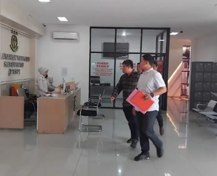 Pelimpahan tersangka MH ke Kejaksaan.